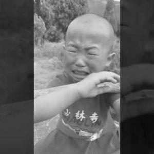 Shaolin boy very exhausting learning kung fu.  Chinese language kung fu